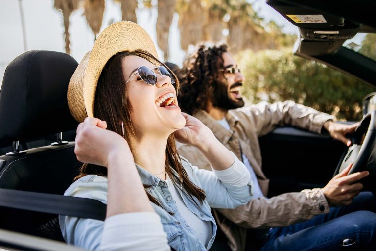 CARFINO Corfu Car Rental tourists in a car