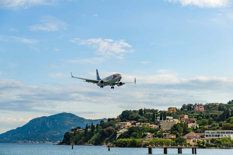 CARFINO Corfu Car Rental plane taking off